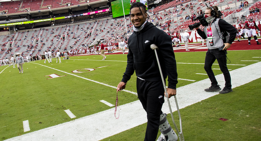 Bama's Waddle back practicing, status for title game unclear