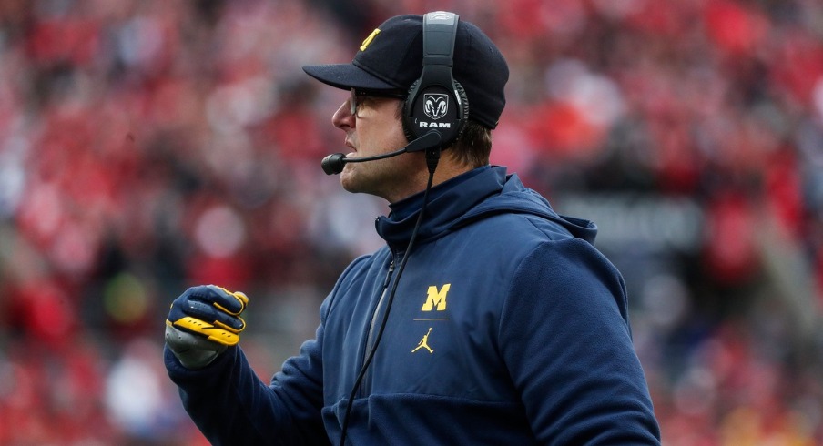 Jim Harbaugh will return as Michigan coach, committing to