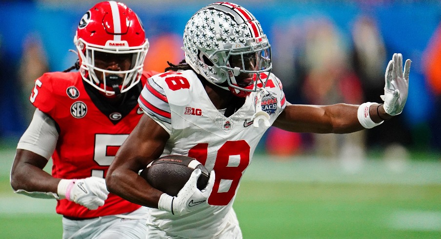 Marvin Harrison Jr.'s accessories are a topic of conversation during Ohio  State's blackout