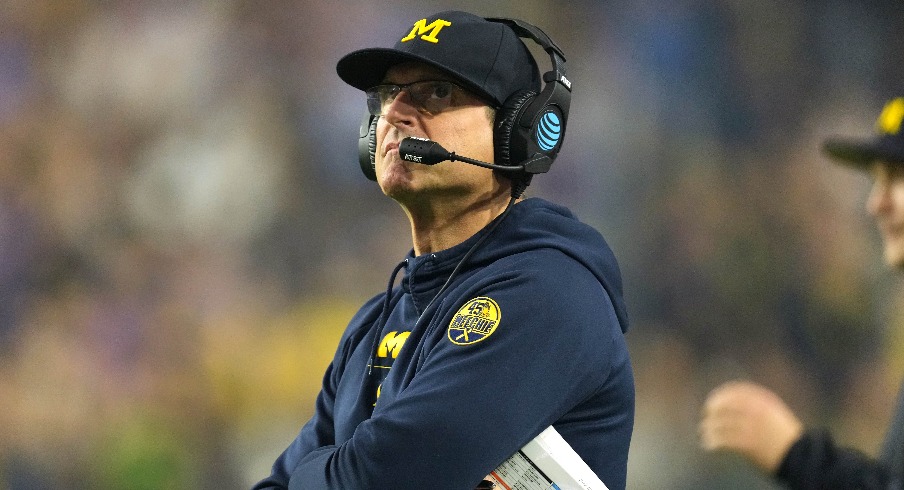 Source: Panthers owner, Jim Harbaugh discuss coaching job