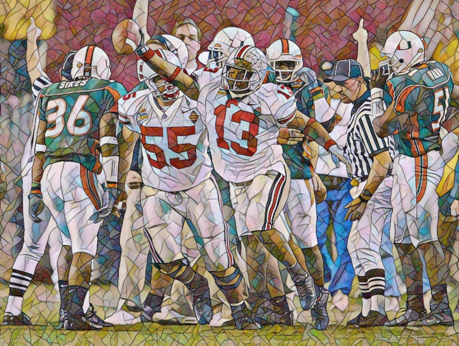 2003 Fiesta Bowl -- OSU vs. Miami -- Maurice Clarett celebrates after he pulled the ball from the hands of Sean Taylor at the National Football Championships at the Sun Devil Stadium in Tempe, Arizona, January 3, 2003. (Dispatch photo by Fred Squillante) Fs Fiesta 65