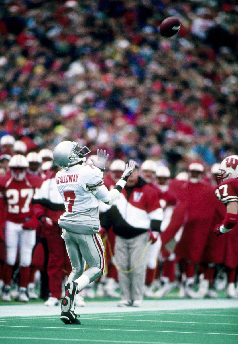 1993; Madison, WI, USA; FILE PHOTO; Ohio State Buckeyes receiver Joey Galloway (7) against the Wisconsin Badgers at Camp Randall Stadium. Mandatory Credit: USA TODAY Sports