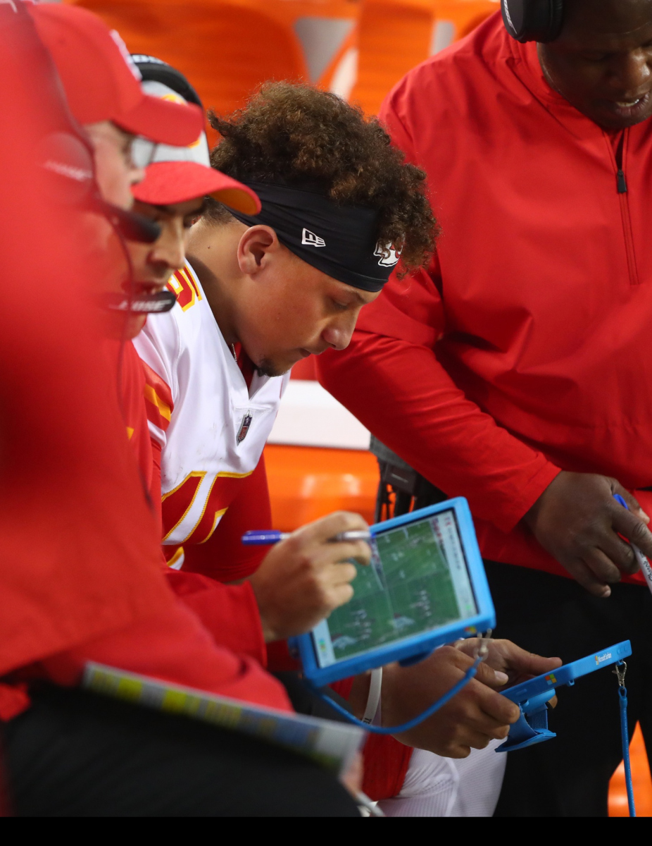 The use of tablets has become a normal part of life on NFL sidelines.