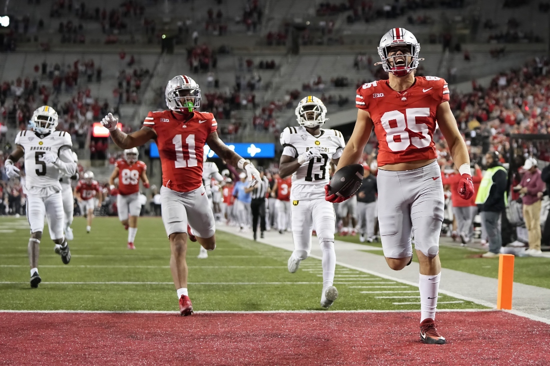 Sep 7, 2024; Columbus, Ohio, USA; Ohio State Buckeyes tight end Bennett Christian (85) runs for a touchdown after making a catch against the Western Michigan Broncos during the second half at Ohio Stadium. Mandatory Credit: Adam Cairns-Imagn Images