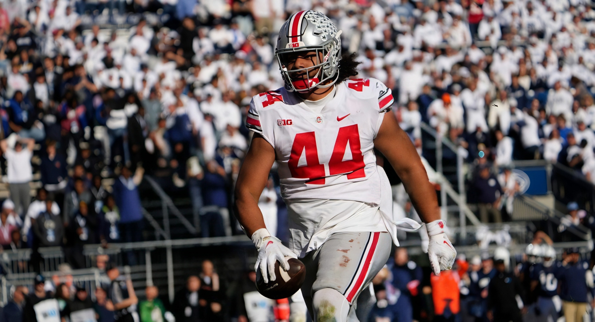 Oct 29, 2022; University Park, Pennsylvania, USA; Ohio State Buckeyes defensive end J.T. Tuimoloau (44) runs for a touchdown after intercepting a pass by Penn State Nittany Lions quarterback Sean Clifford during the fourth quarter of the NCAA Division I football game at Beaver Stadium. Mandatory Credit: Adam Cairns-The Columbus Dispatch Ncaa Football Ohio State Buckeyes At Penn State Nittany Lions