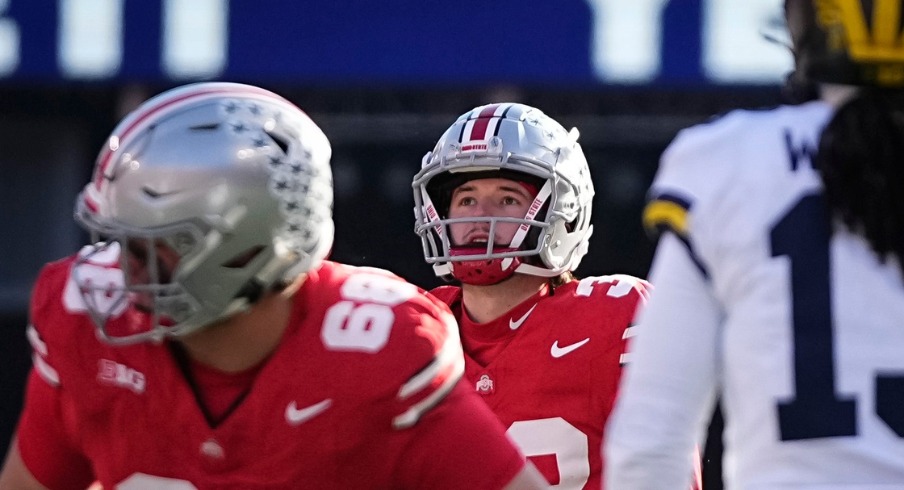 Ohio State Buckeyes place kicker Jayden Fielding (38) watches a missed field goal attempt during the NCAA football game against the Michigan Wolverines at Ohio Stadium in Columbus on Tuesday, Dec. 3, 2024. Michigan won 13-10.