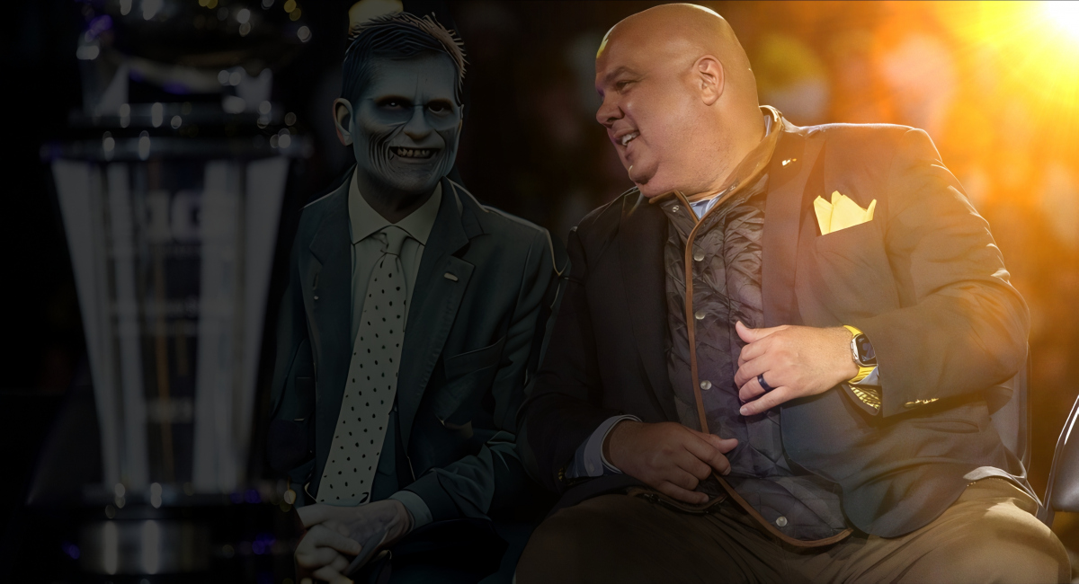 Jan 13, 2024; Ann Arbor, MI, USA; Michigan head coach Jim Harbaugh talks to athletic director Warde Manuel during the national championship celebration at Crisler Center in Ann Arbor on Saturday, Jan. 13, 2024. Mandatory Credit: Junfu Han-Imagn Images