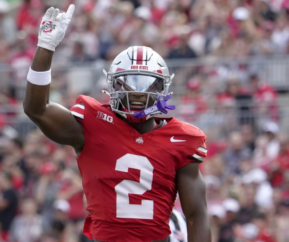 August 31, 2024; Columbus, Ohio, USA; Ohio State Buckeyes safety Caleb Downs (2) celebrates after sacking Akron Zips quarterback Ben Finley (10) during the first half of Saturday’s NCAA Division I football game at Ohio Stadium.