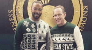 Here's a photo of Michigan State coach Mark Dantonio wearing an ugly holiday Christmas sweater.