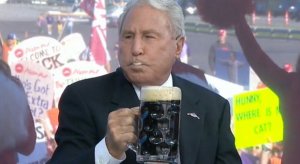 Lee Corso drinks a beer @CollegeGameDay