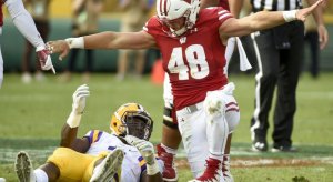 Sep 3, 2016; Green Bay, WI, USA; Wisconsin Badgers linebacker Jack Cichy (48) reacts after stopping LSU Tigers running back Leonard Fournette (7) short of a first down in the second quarter at Lambeau Field. Mandatory Credit: Benny Sieu-USA TODAY Sports