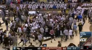 St. Bonaventure fans storm the court.