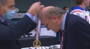 Team USA assistant coach Steve Miller gets his gold medal