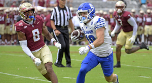 Memphis wide receiver Koby Drake runs away from Florida State cornerback Azareye’h Thomas