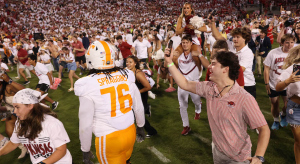 Arkansas fans celebrate the Razorbacks’ win over Tennessee