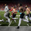 The Tennessee Volunteers take the field for warm ups without shirts in sub-freezing temperatures prior to the College Football Playoff first round game against the Ohio State Buckeyes at Ohio Stadium in Columbus on Dec. 21, 2024.