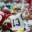 LSU Tigers quarterback Tommy Hodson (13) sets to throw the ball against the Ohio State Buckeyes at Ohio Stadium.