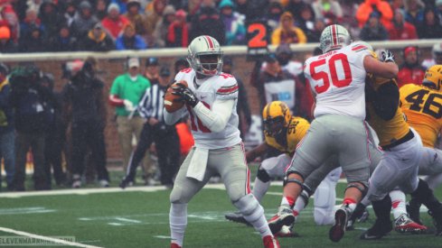 J.T. Barrett threw for 200 and nearly ran for another 200.