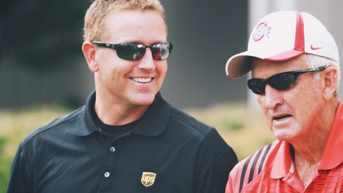 Kirk Herbstreit and John Cooper, trading jokes (no idea why Kirk is wearing a UPS shirt)