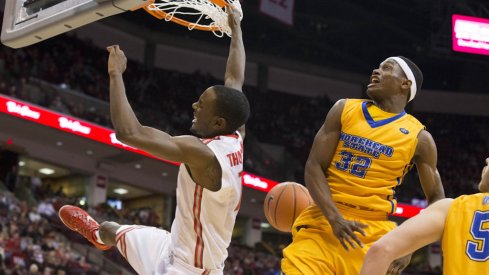 Sam Thompson throws down an alley-oop.