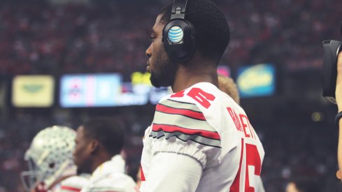 J.T. Barrett wearing his headset.