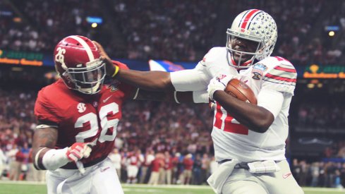 Cardale Jones administering the Stiff Arm of Justice to Alabama's Landon Collins