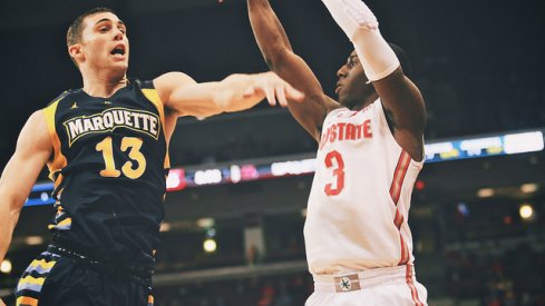 Shannon Scott attempts a shot against Marquette. 