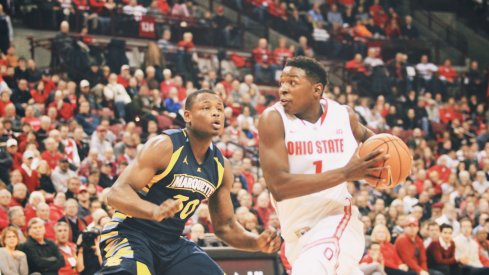 Jae'Sean Tate drives against Marquette.