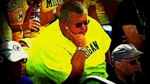 Michigan fans watching the Little Brown Jug slip away, 2014