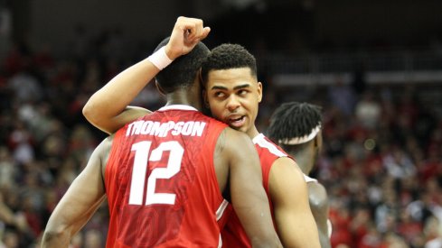 D'Angelo Russell hugs Sam Thompson