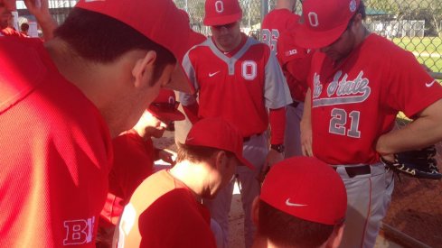 Waiting in the dugout before the Pitt game.