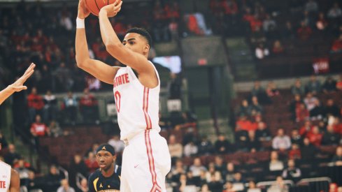 D'Angelo Russell launches a 3-pointer vs. Marquette