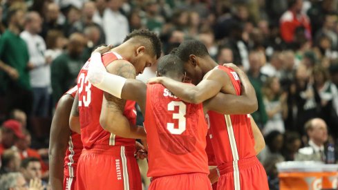 Ohio State huddles vs. Michigan State.