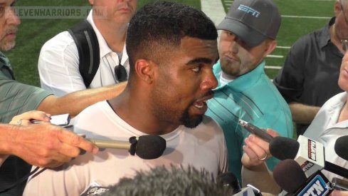 Ezekiel Elliott speaks to the media