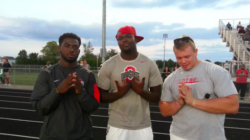 J.T. Barrett, Cardale Jones, and Pat Elflein observe a Pickerington North/Central Crossing game. 