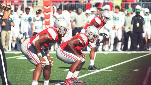 Joshua Perry, Raekwon McMillan, and Darron Lee