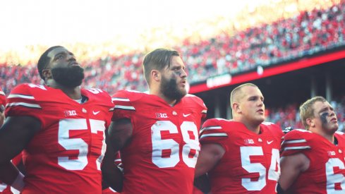 Ohio State signs Carmen Ohio after its game.