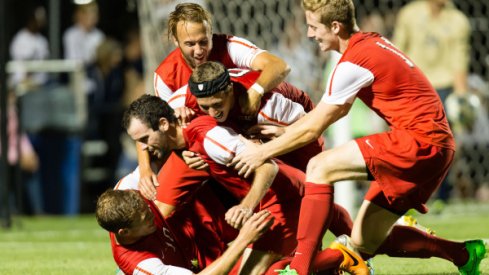 Men's soccer team celebrates a 3-3 draw against No. 11 Akron