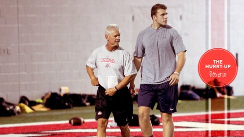 Jake Hausmann and Ohio State assistant coach Kerry Coombs.