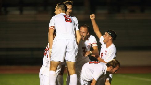 Ohio State men's soccer team celebrates a goal.