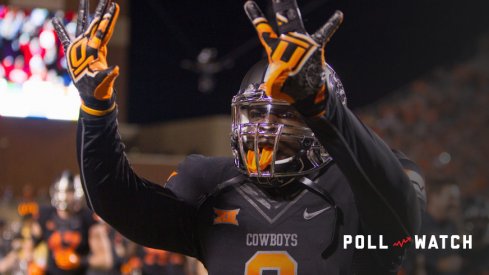 November 7, 2015: Oklahoma State Cowboys linebacker Gyasi Akem (9) celebrates after the Big 12 NCAA football game between the TCU Horned Frogs and the Oklahoma State Cowboys at Boone Pickens Stadium in Stillwater, Oklahoma. Oklahoma State defeated 8th ranked TCU 49-29