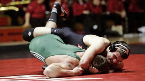 wrestlers taking it to the hoop.