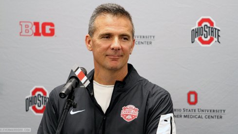 Urban Meyer meets with reporters Monday at the Woody Hayes Athletic Center.