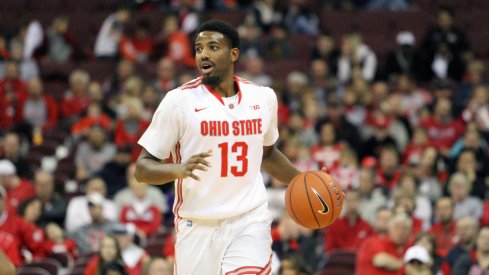 JaQuan Lyle brings the ball up the floor. 