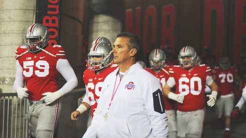 Urban Meyer salutes the vets.