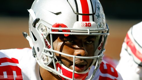 J.T. Barrett tallied nearly 225 yards of total offense against Illinois in his return from suspension.