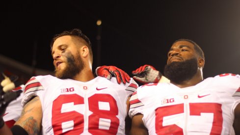 Taylor Decker and Chase Farris sing Carmen Ohio.