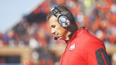 Urban Meyer strolls the sidelines at Illinois. 