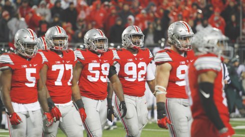 Ohio State's defense walks off the field vs. Michigan State.