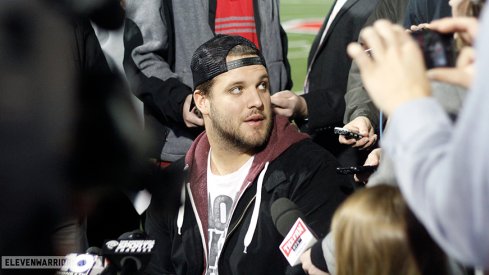 Taylor Decker meets with the media.